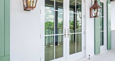 The exterior of a home with Marvin Coastline Outwswing French Doors