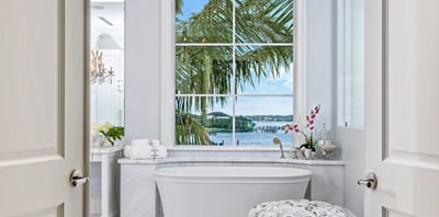 Marvin Coastline Direct Glaze Narrow Frame in a bathroom with a free standing tub