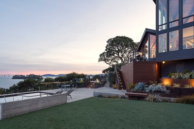 The exterior of a home in San Rafael, California, facing the bay with large Marvin Ultimate windows and doors.