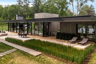 Exterior of home with Marvin Signature Modern Multi-slide doors and Direct Glaze windows