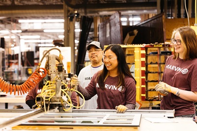 Factory workers in the Marvin Warroad warehouse assembling window