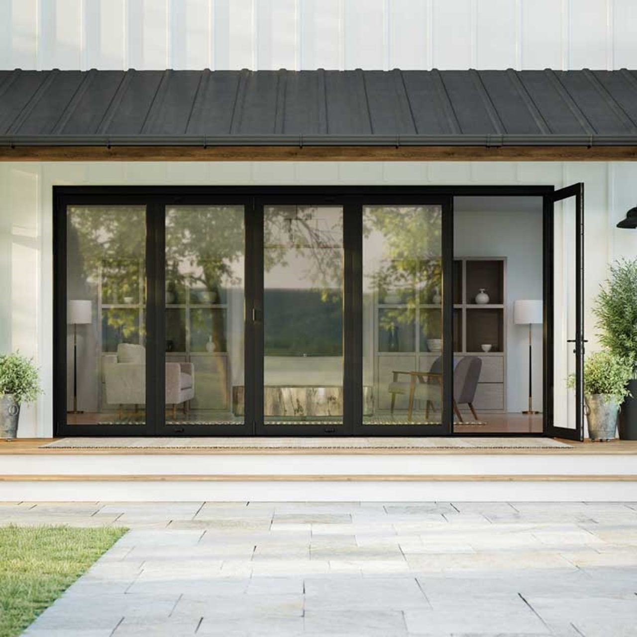 Home exterior patio with black elevate bi fold doors